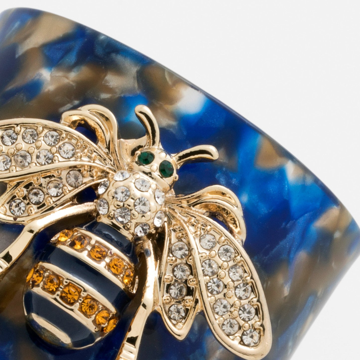 Stripey bee resin napkin rings, blue tortoiseshell, set of 4