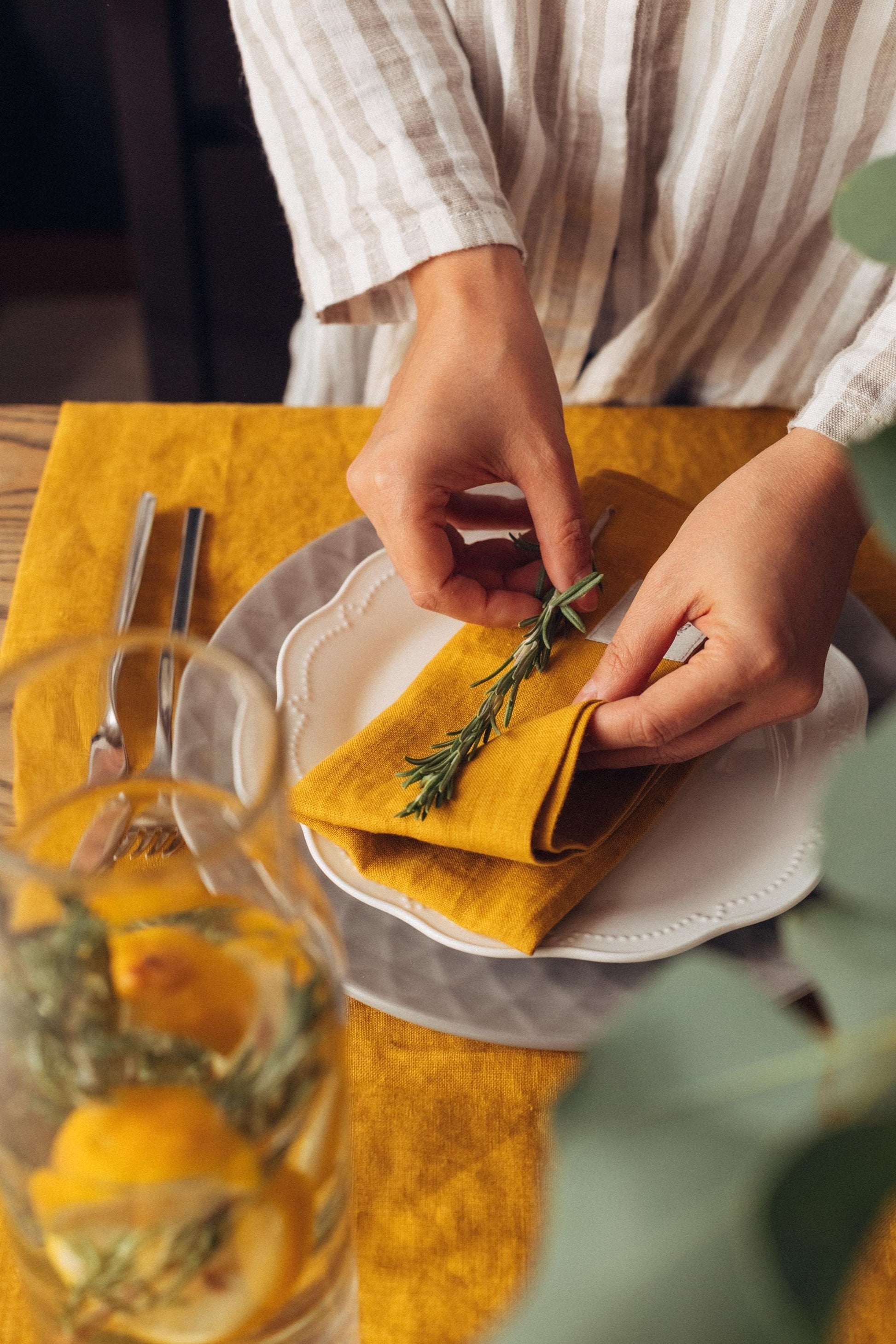 Elegant summer table setting with linen runner and napkins in honey color